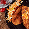 Pollo Milanese cu salată de măr, morcovi şi ţelină